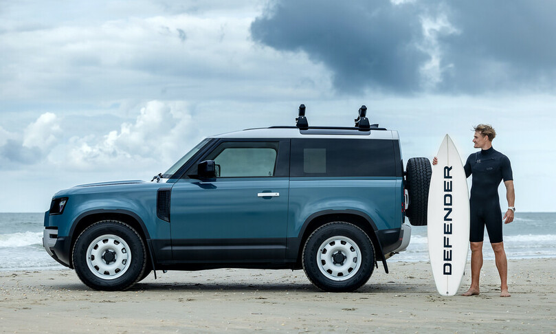 Luxus-Defender mit Surfbrett